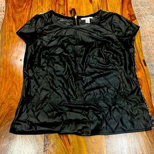 Pleather shirt in front, black & white with zipper in back. Size medium